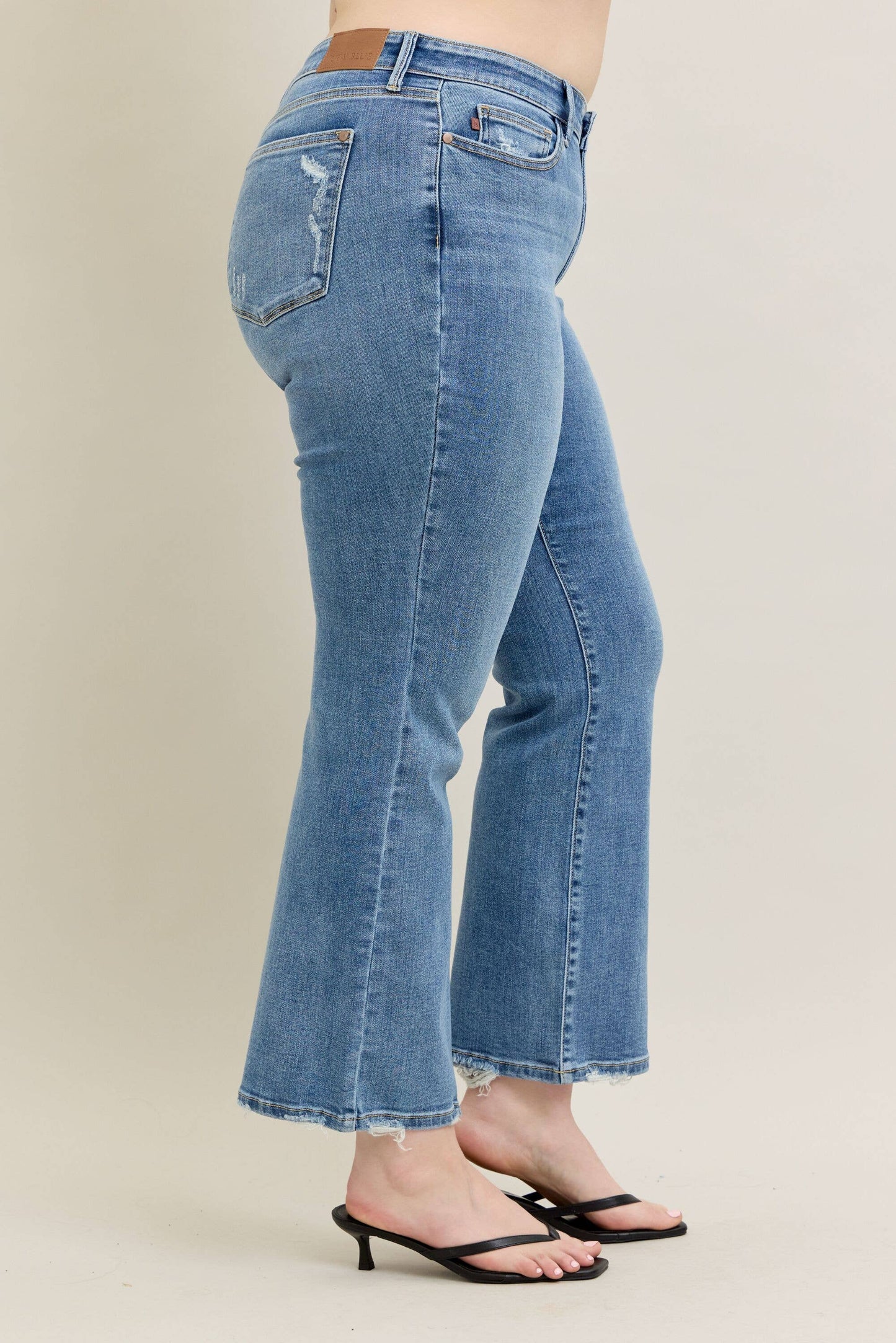 Judy Blue Plus Size Mid Rise Vintage Wash Bootcut Jeans with Distressed Hem