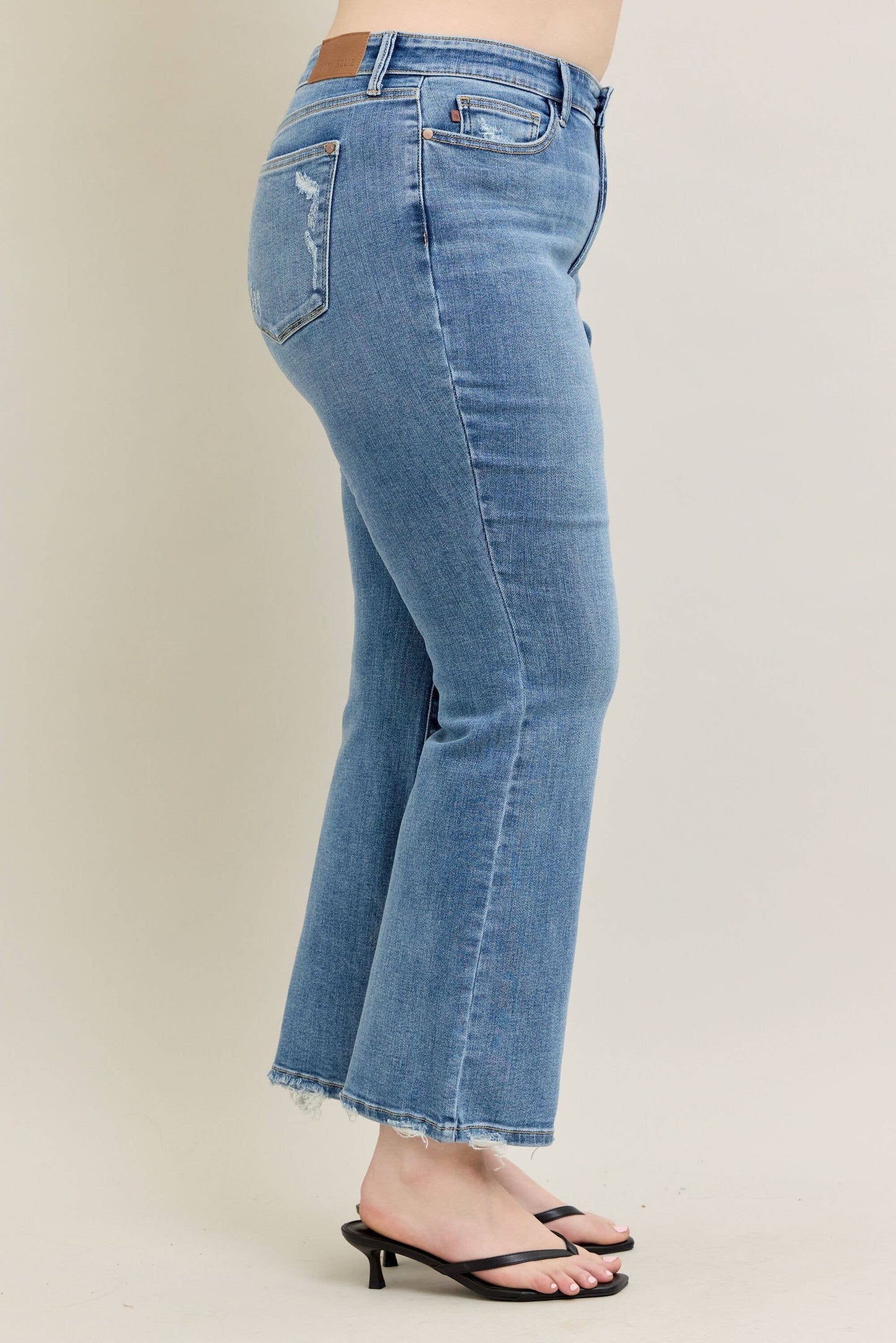 Judy Blue Plus Size Mid Rise Vintage Wash Bootcut Jeans with Distressed Hem