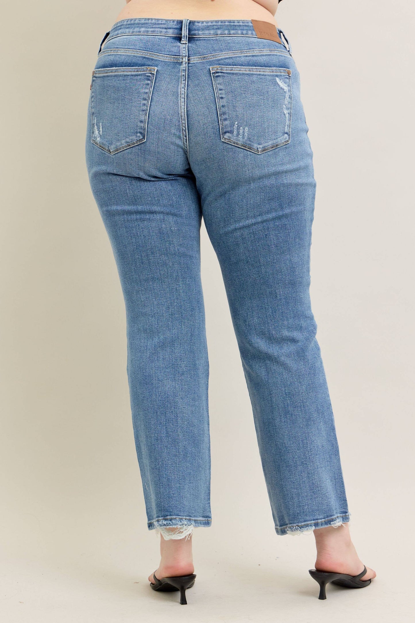 Judy Blue Plus Size Mid Rise Vintage Wash Bootcut Jeans with Distressed Hem