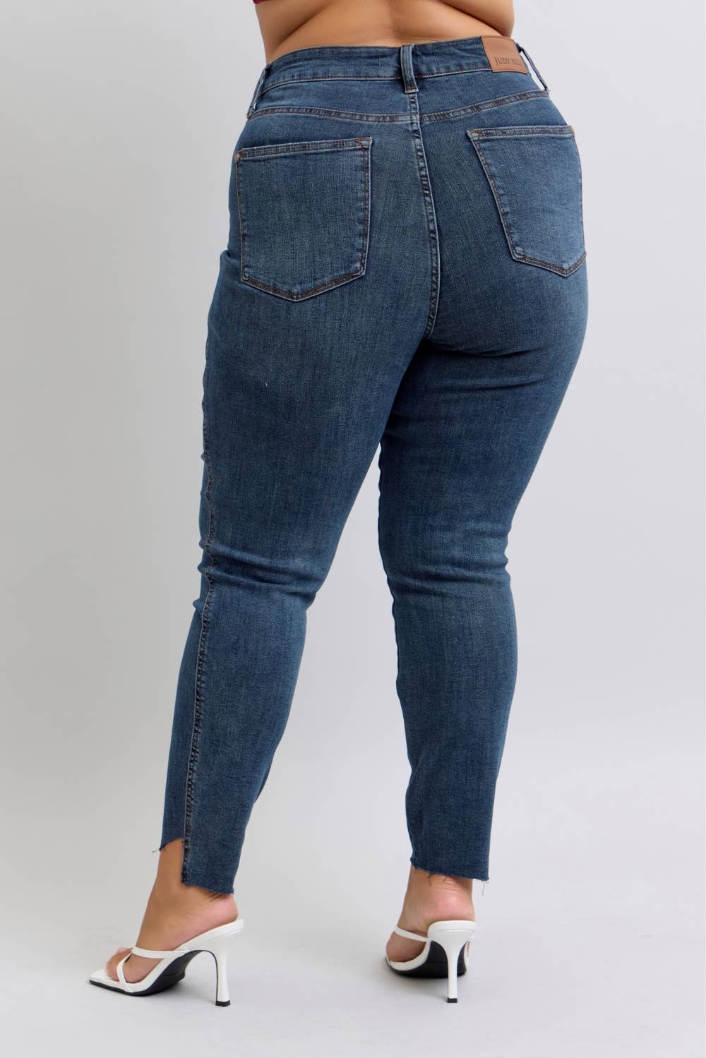 Judy Blue Plus Size High Waisted Tummy Control Step Hem Skinny Jeans