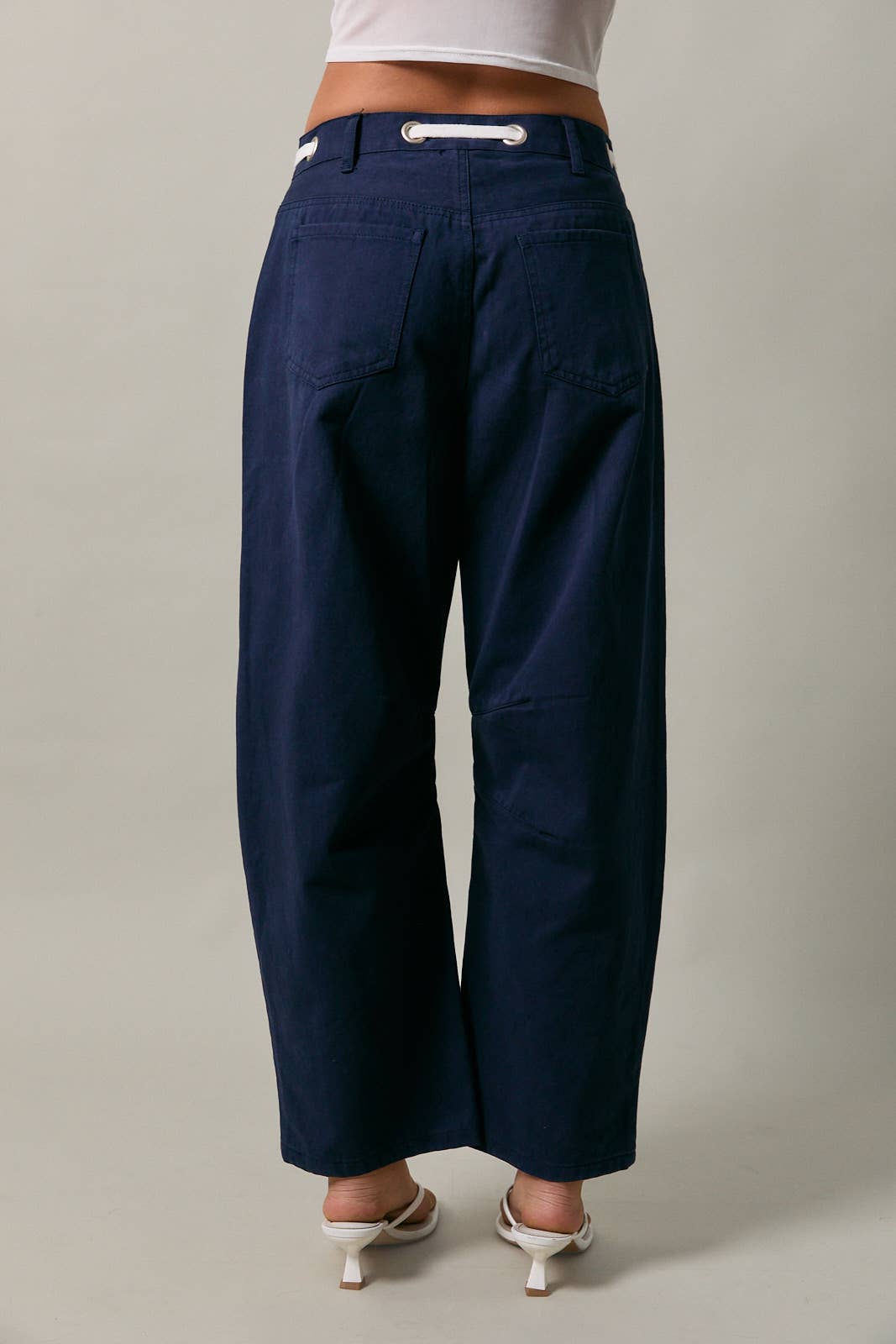 HIGH-RISE EYELET DETAIL BARREL PANTS