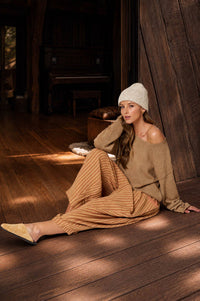 Textured raw edge long sleeve sweater