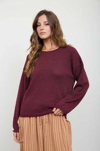 Textured raw edge long sleeve sweater