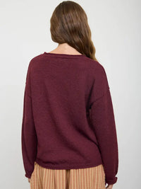 Textured raw edge long sleeve sweater