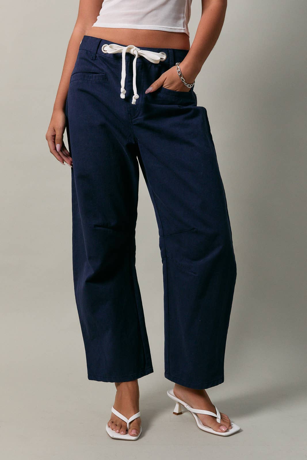HIGH-RISE EYELET DETAIL BARREL PANTS